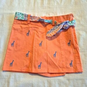 Girls skort orange with blue embroidered giraffes, brand tag is removed size 6X